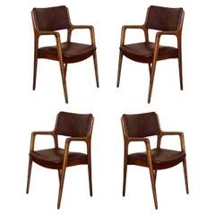 Retro Modern Teak and Brown leather armchairs in Erik Buch Style