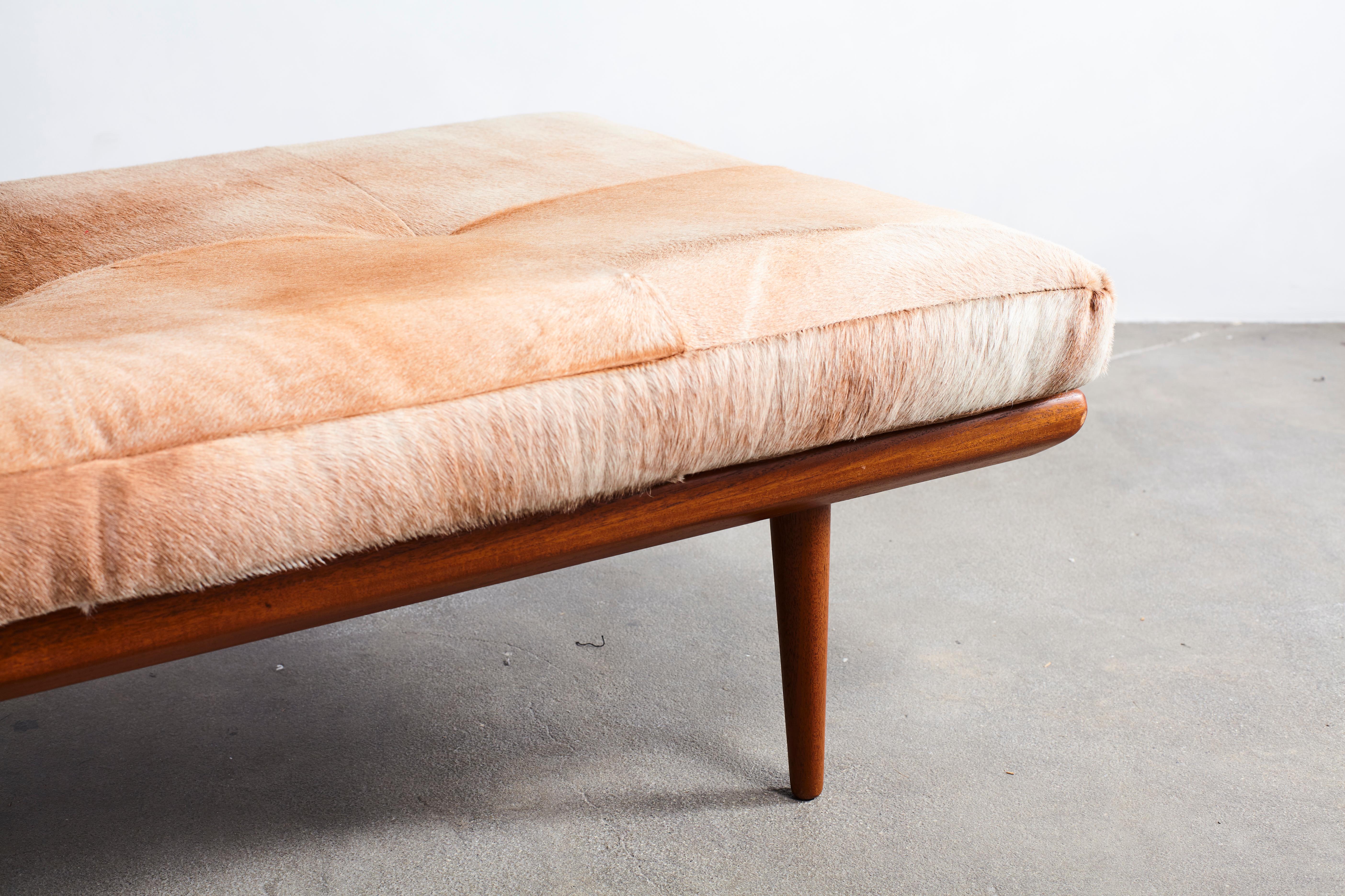 Modern Teak Bench with Tapered Legs, Upholstered in a Quilted Horse Hide Cushion In Distressed Condition In Los Angeles, CA