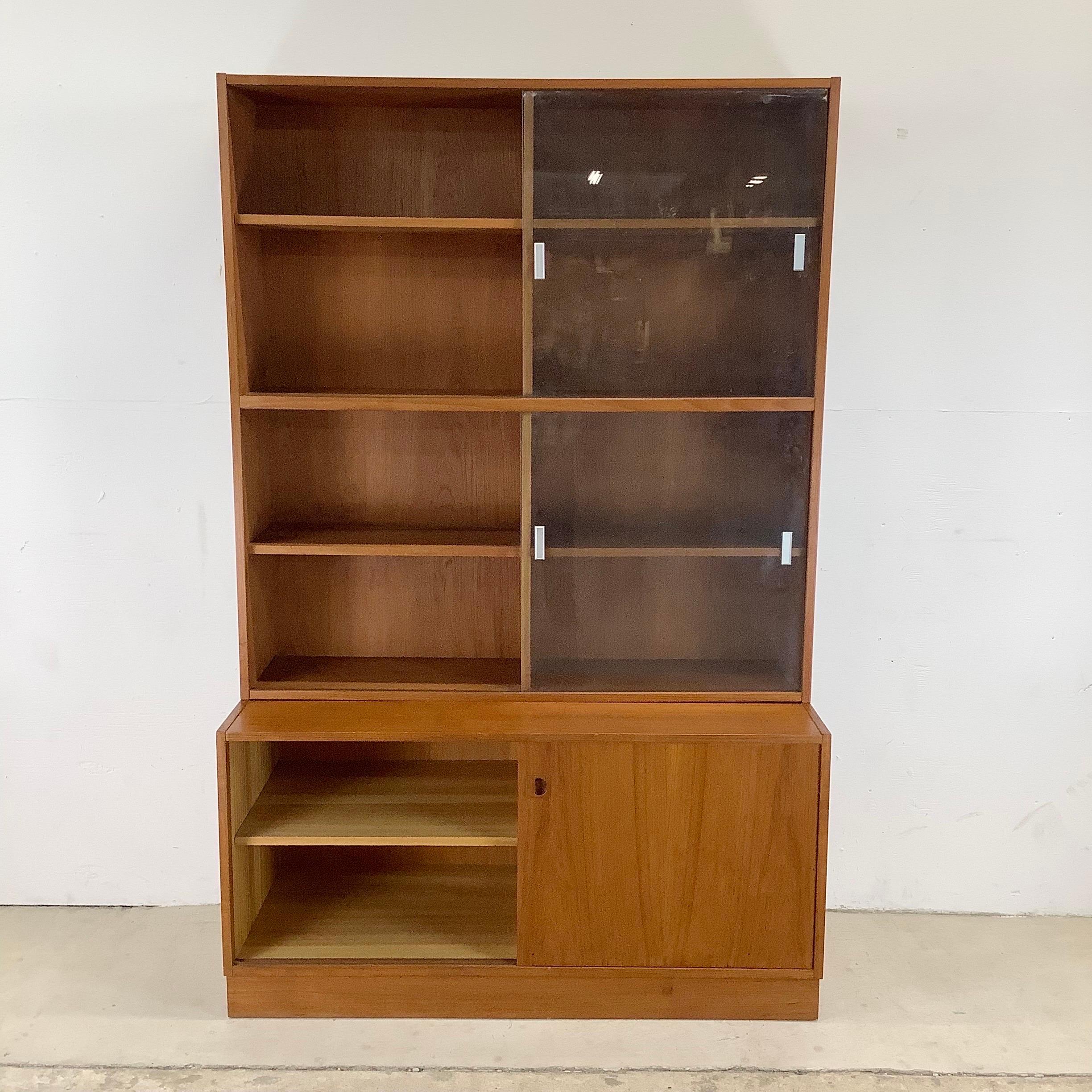 teak bookcase with doors