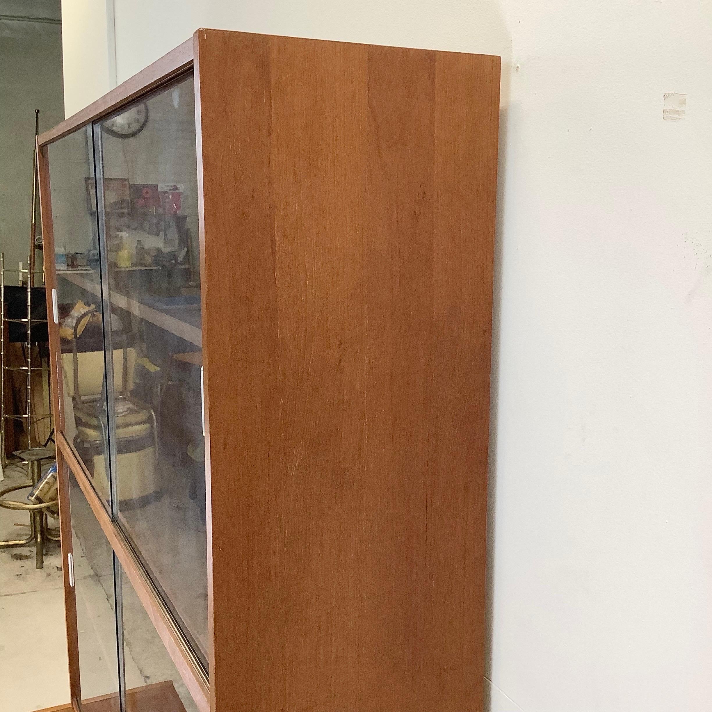 Modern Teak Bookcase With Cabinet and Glass Sliding Doors In Good Condition For Sale In Trenton, NJ