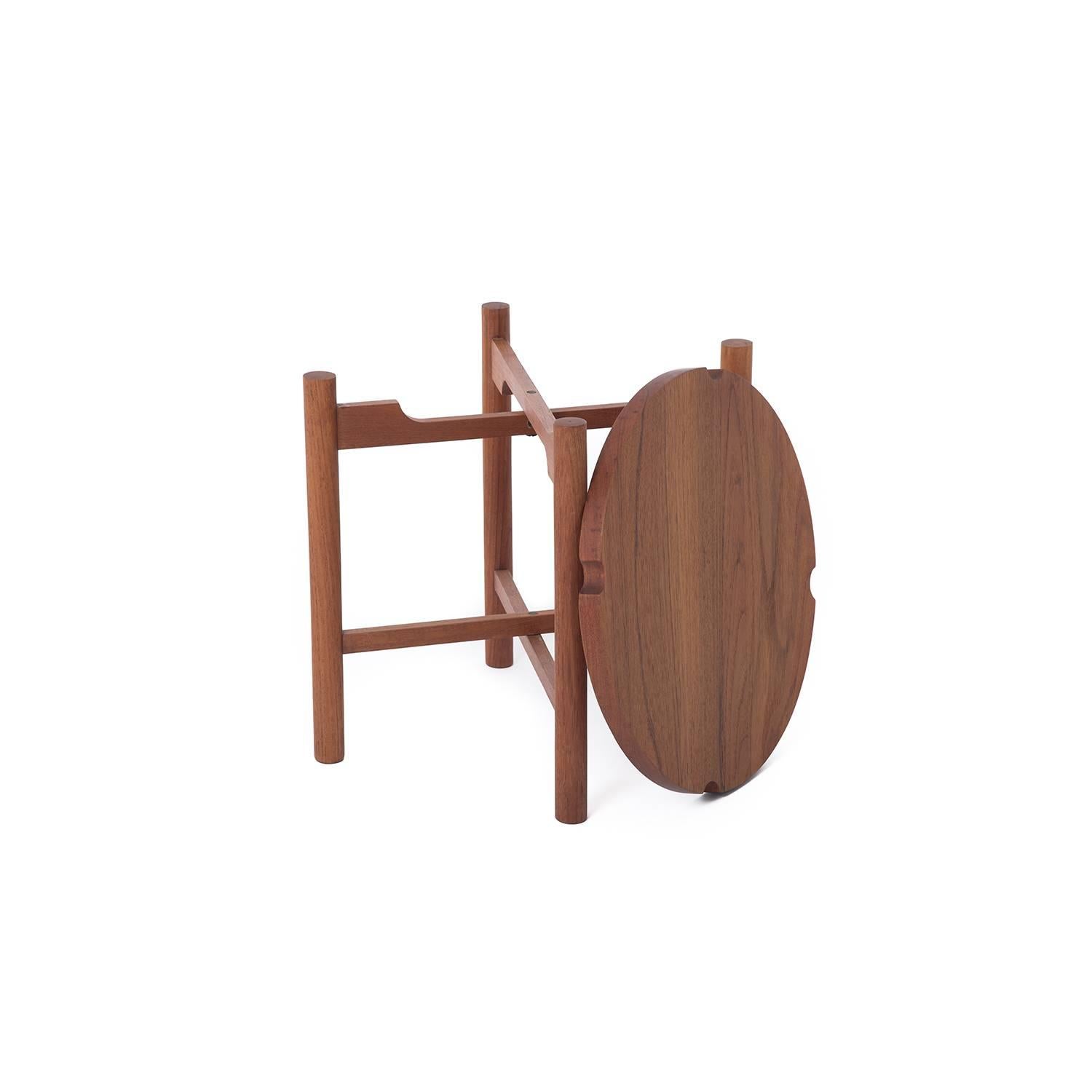 With a removable teak top and folding teak base, this table is a breeze to store and transport.