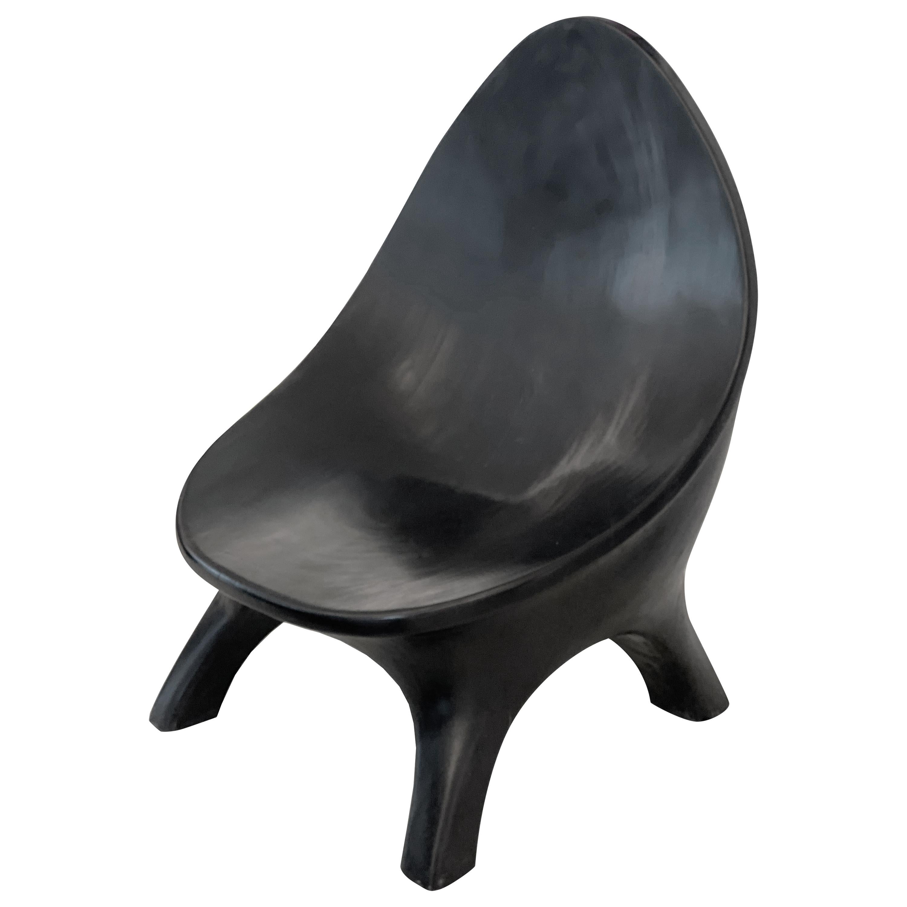 Einzigartiger moderner Womb Chair aus Teakholz