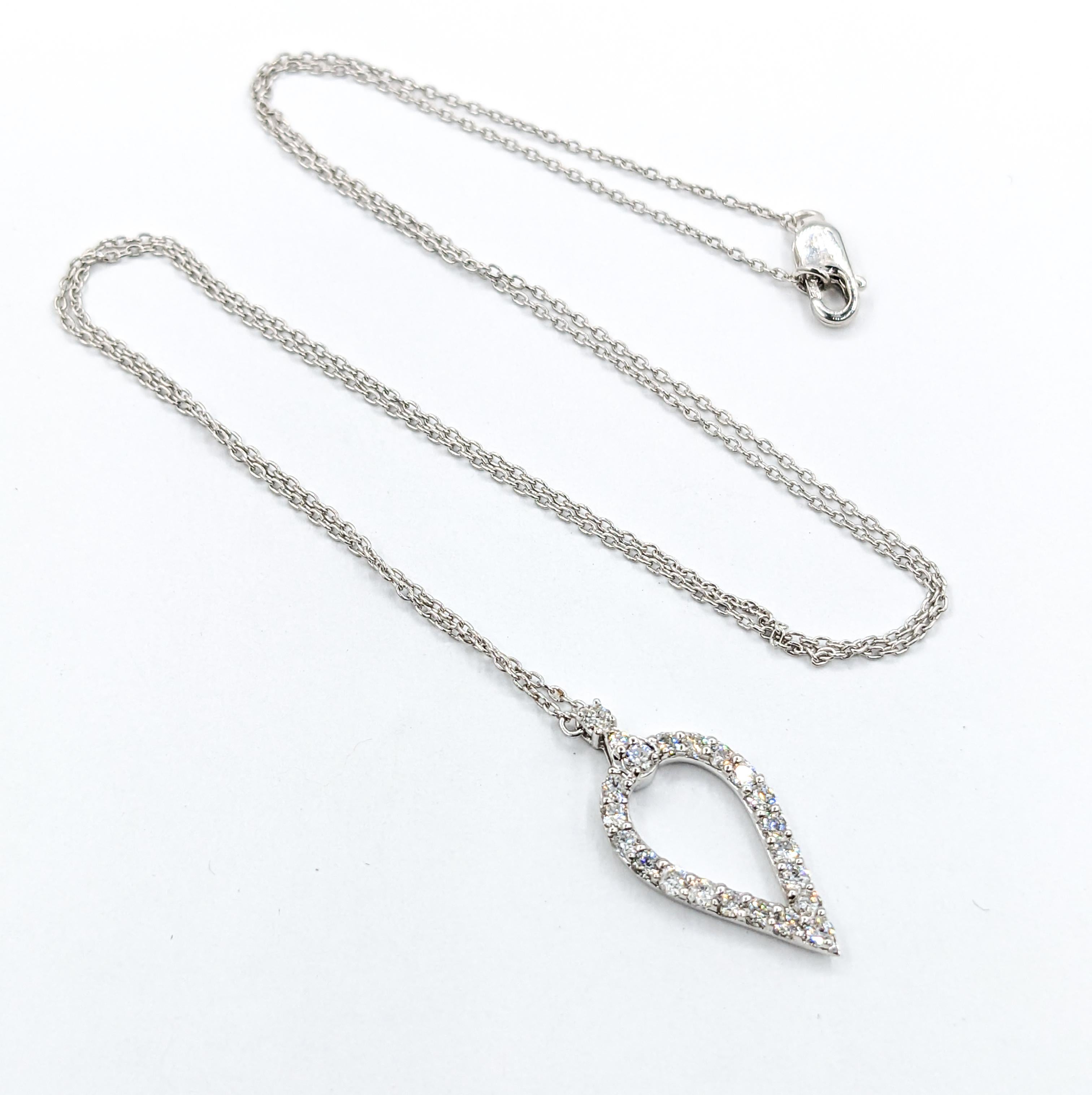 Modern Teardrop Diamond Pendant Necklace in White Gold

Experience the epitome of luxury and elegance with our exquisite necklace, masterfully crafted from the finest 14k white gold. This breathtaking piece is adorned with a cascade of .46ctw round