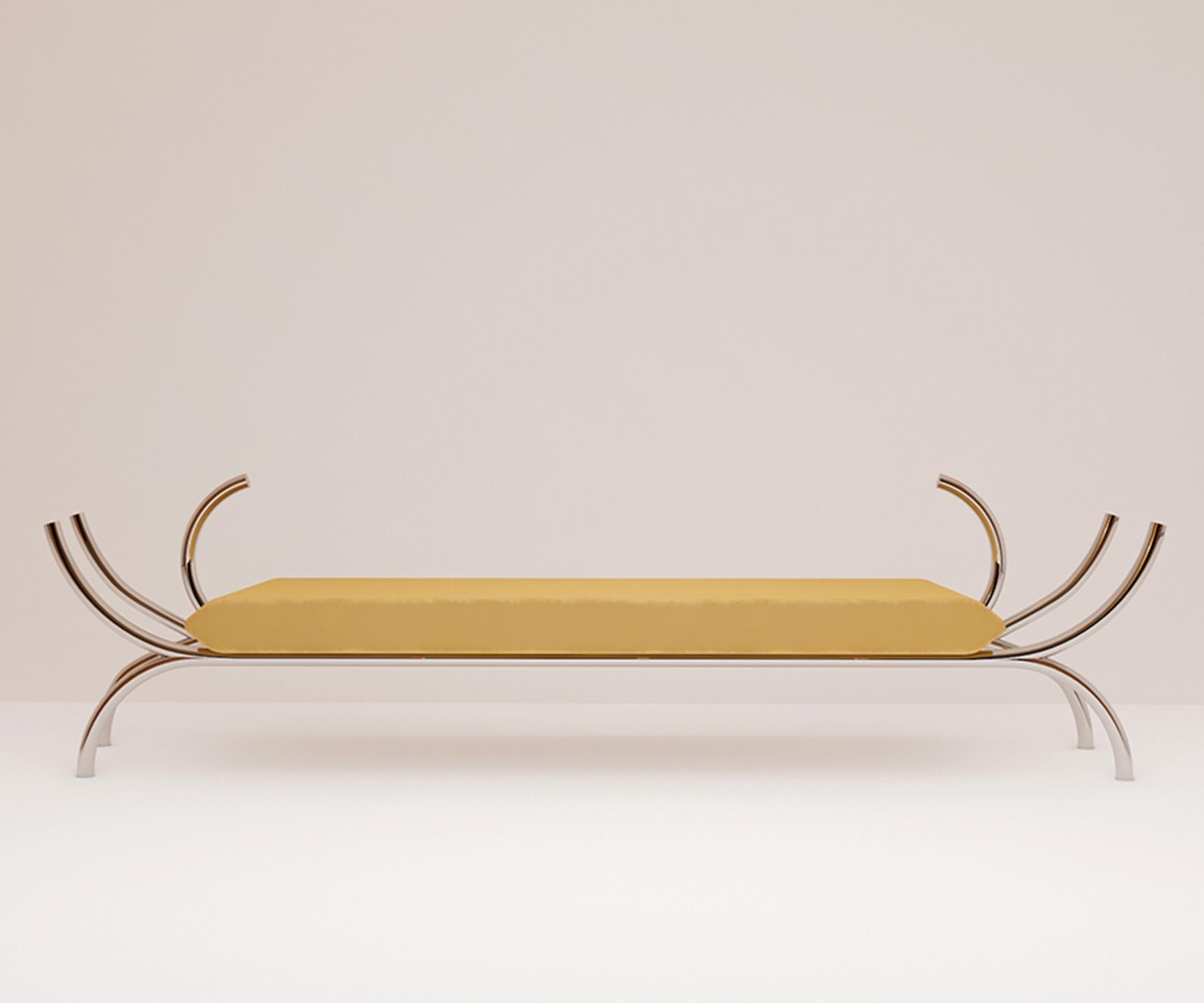 Statement bench with ten free arms, and geometric seat, inspired by ancient seats from oriental culture
Upholstered in a pleasing light yellow fabric.

Dimension. W 280 x D 70 x H 45 cm
Material. Velvet fabric seat, with steel legs.
 