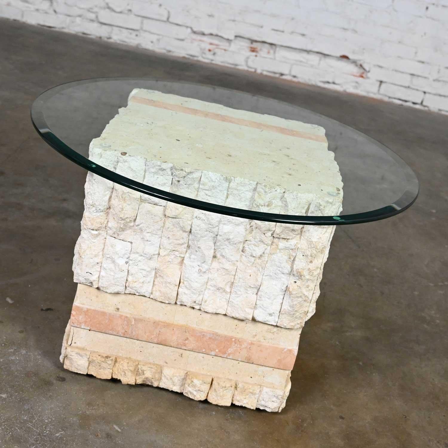 Fabulous modern tessellated Mactan stone square end table with a diagonal peach stripe and a round glass top with beveled edge in the style of Maitland Smith. Beautiful condition, keeping in mind that this is vintage and not new so will have signs