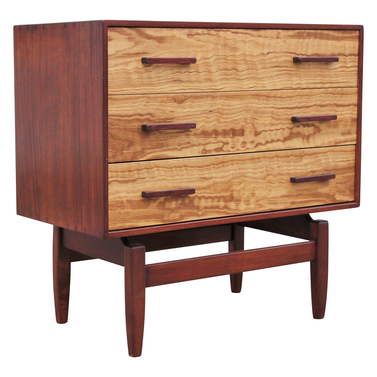 Custom three-drawer floating side table or nightstand by Norm Stoeker. The drawers are beautifully grained with dovetail joints to the top. Features a rich grain and beautiful hand hewn joinery. Beautiful quality and construction including