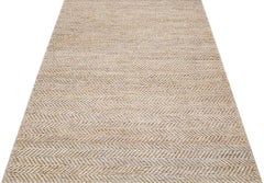 Tappeto per l'area in iuta e cotone intrecciati a mano con texture moderna in color beige naturale