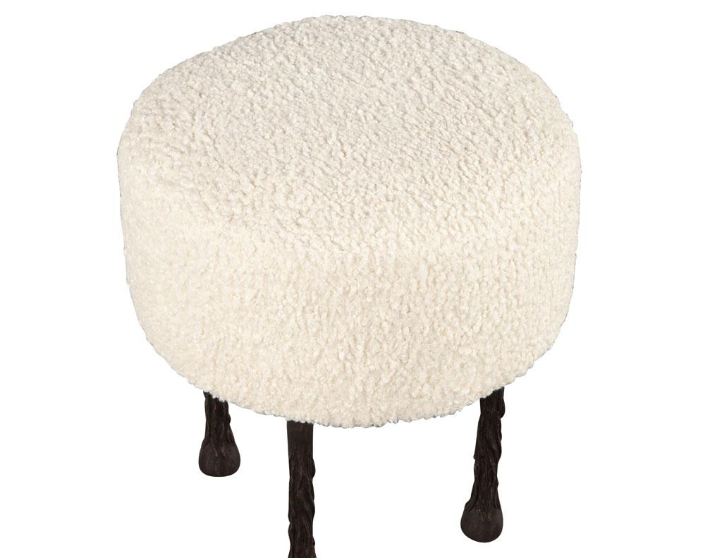 Modern textured stool on sculpted metal legs by Ellen Degeneres Mammoth Stool. Thick plush faux sheep fabric with unique sculpted black metal legs. Part of the Ellen Degeneres collection by EJ Victor, the Mammoth Stool. Price includes complimentary