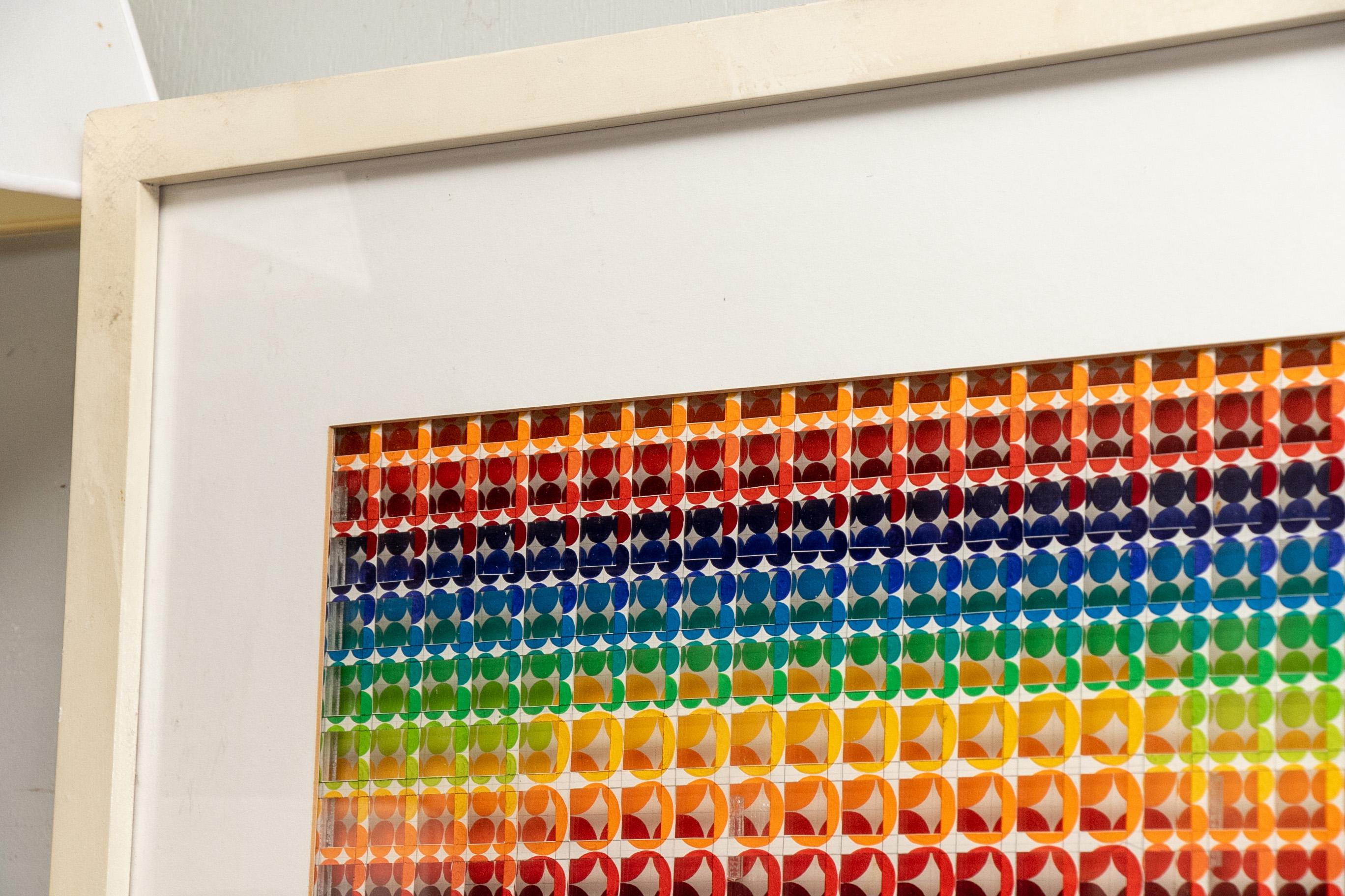 Modern three-dimensional art work by Shirley Lazarus Toran, mixed media, painted acrylic circles on pencil grids on paper. Stereometric composition in two levels with the front one cutout and placed asymmetrically over the back one. With a