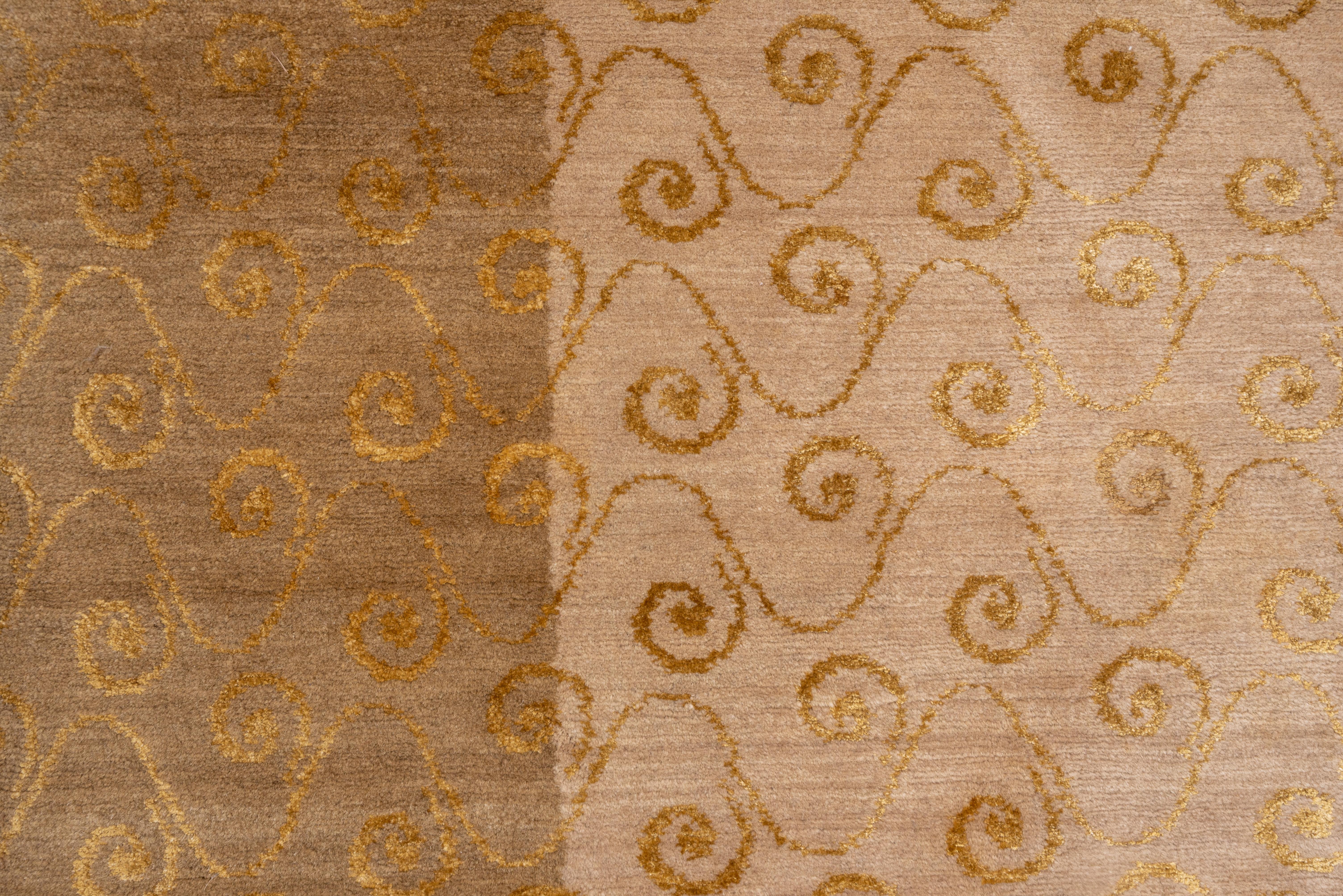 The sand field displays rows and offset rows of small snail shell spirals developing from undulating lines. Similar motif in the borders. Rust and yellow secondary tones. As new condition.
   