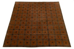 Moderna alfombra tibetana de rejilla geométrica de lana y seda anudada a mano en naranja quemado