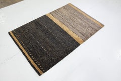 Tapis tibétain moderne gris avec motif linéaire