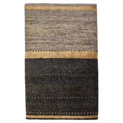 Tapis tibétain moderne gris avec motif linéaire