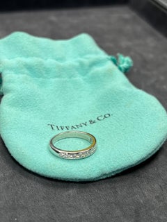 Modern Tiffany & Co Natural .17 Carat Diamond Halfway Platinum Engagement Band