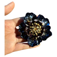 Modern Titanium and Diamond Floral Brooch with Iridescent Blue Petals