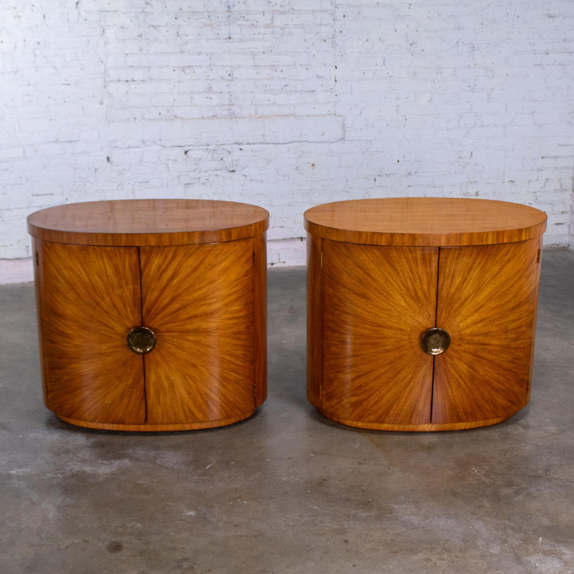 Handsome vintage Modern to Art Deco Revival pair of Arbus nightstands or end tables 6000 Series by Henredon composed of oval book matched burl wood frames 
cast bronze pulls. Beautiful condition, keeping in mind that this is vintage and not new