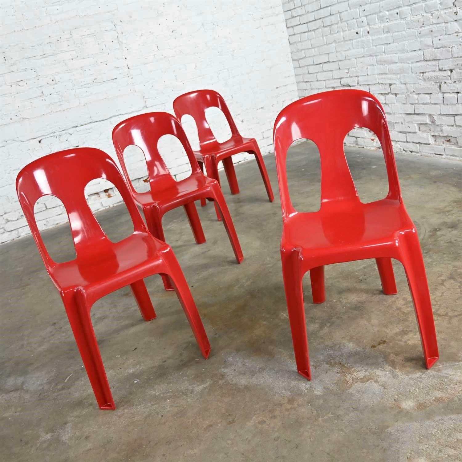 French Modern to Post Modern Henry Massonnet Red Plastic Stacking Chairs Set of 4