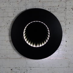 Modern to Postmodern Infinity Vortex Wall Mirror Round Black Laminate Frame