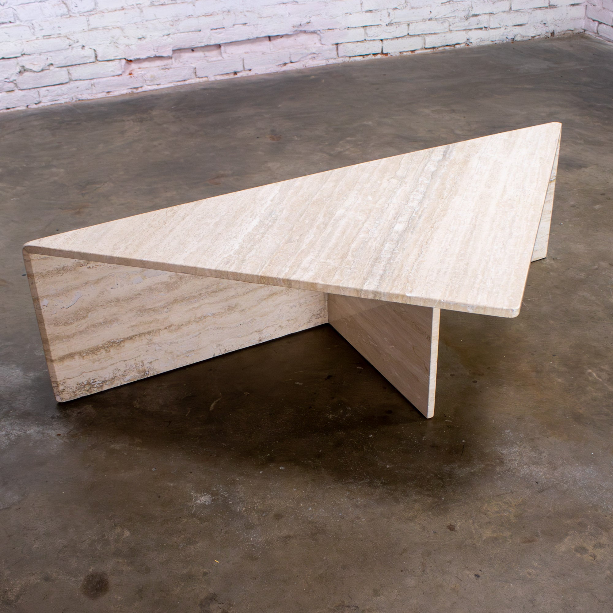 Modern to Postmodern Triangle Travertine Coffee or Cocktail Table Style Up & Up In Good Condition For Sale In Topeka, KS