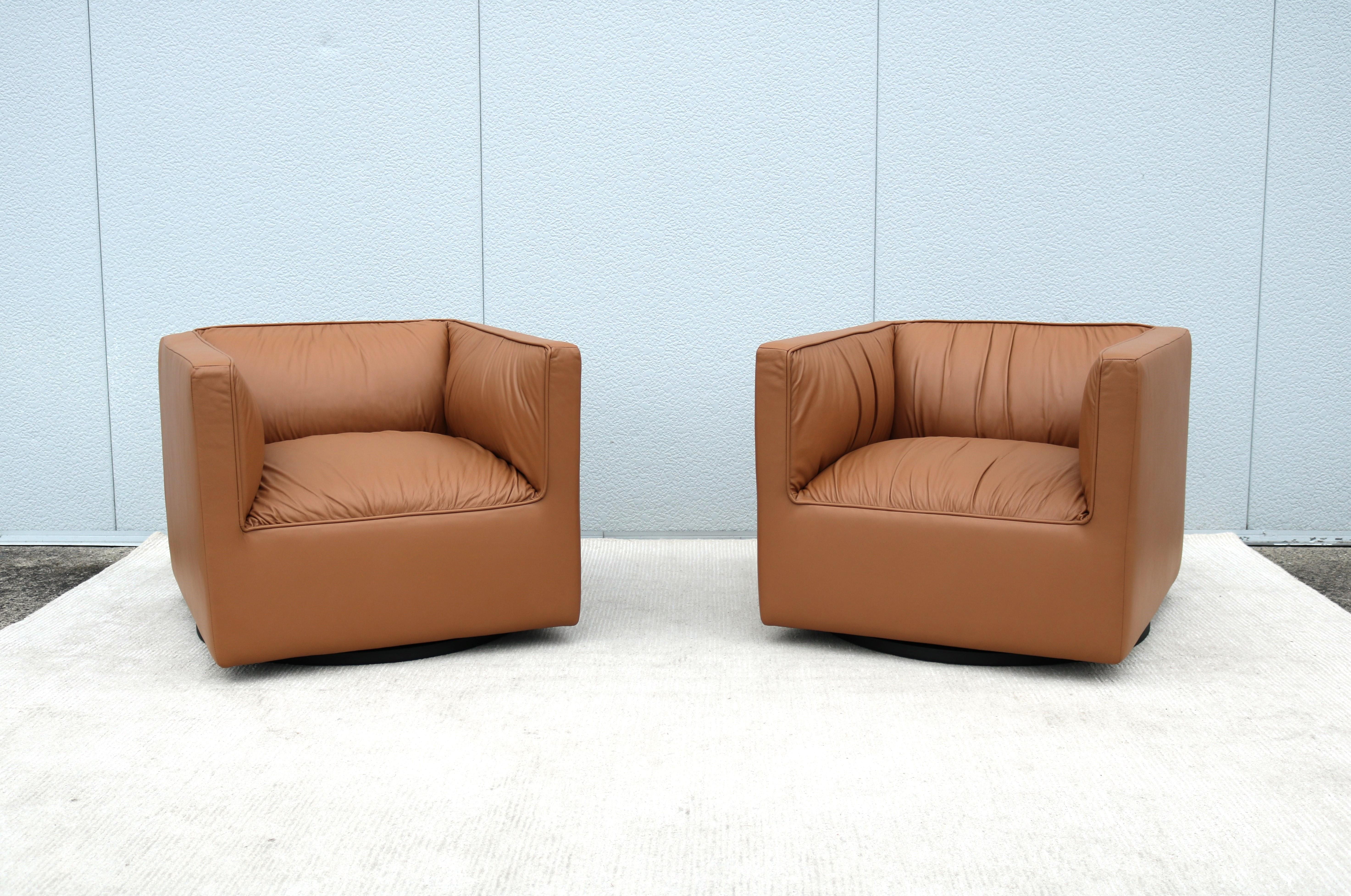 American Modern Toan Nguyen for Studio TK Infinito Leather Swivel Lounge Chairs - a Pair For Sale