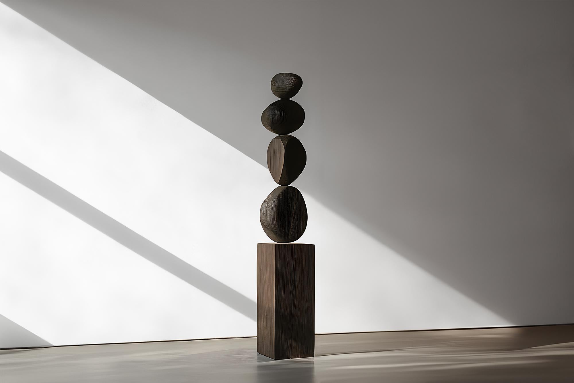 Modern Totem in Dark Elegance, Carved Burned Oak, Presented in Still Stand No95
_
Joel Escalona's wooden standing sculptures are objects of raw beauty and serene grace. Each one is a testament to the power of the material, with smooth curves that
