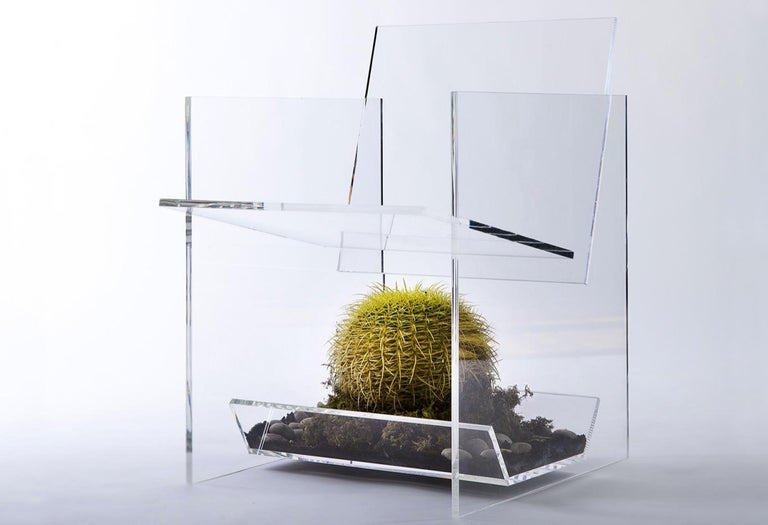 The core piece of our 'Bond' Series, the 'Cactus Chair', is a completely transparent chair that houses a cactus beneath the seat, which captures the element of humor that runs through all of the Bond Series’ pieces.  The defining feature of the