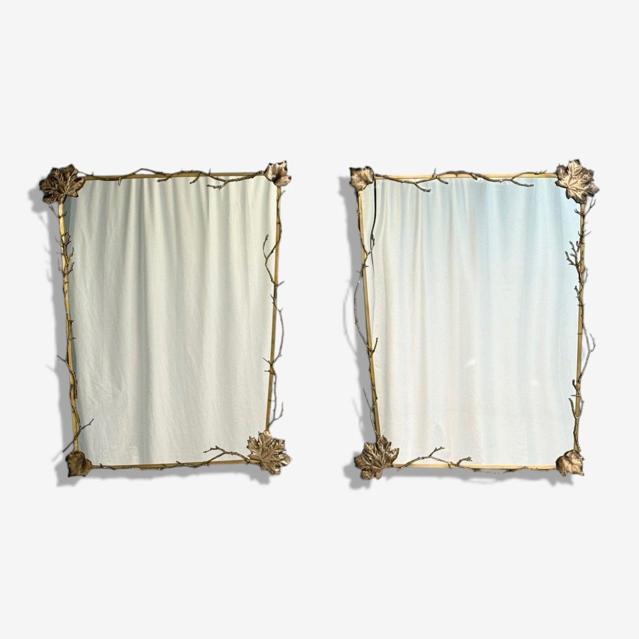 Contemporary Trapezoidal Bronze Wall Mirrors, Branch and Leaf Motif, France, 21st C.

Pair of one of a kind and unique bronze wall mirrors made in France by LYNX design. Each example features a trapezoidal shaped brass frame adorned with cast and