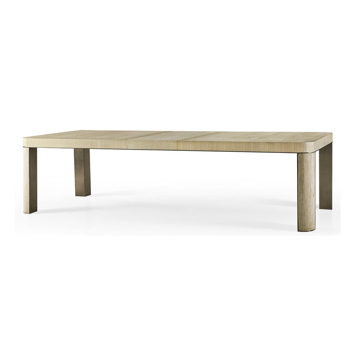 Modern Travertine Leg Extension dining table, featuring classic forms and clean lines, the travertine leg dining table is honed from time-tested beautiful natural stone. Travertine corner legs are embellished with a stainless steel edge banding in