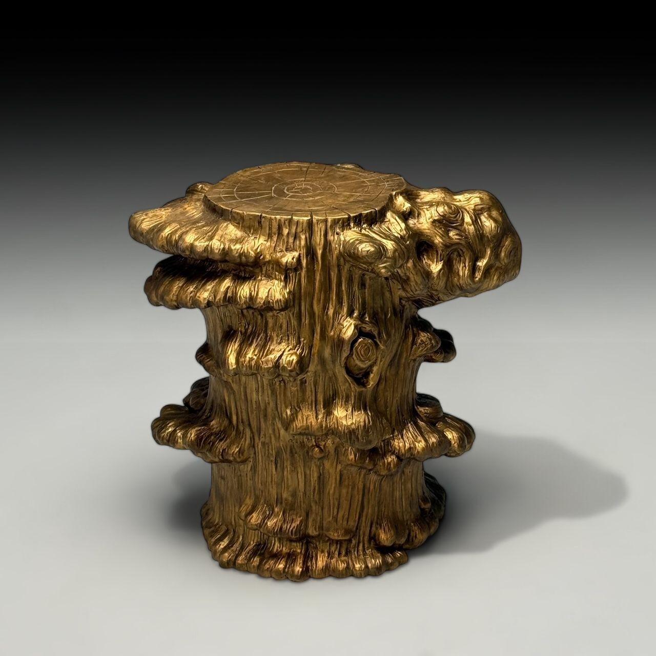 Burled Tree Trunk Sculptural Side Table or Stool, Patinated Cast Bronze, American, 21st C.

A cast bronze side table or stool with a burled texture, this piece is heavy and substantial, featuring a beautiful, aged patina. Its solid construction and