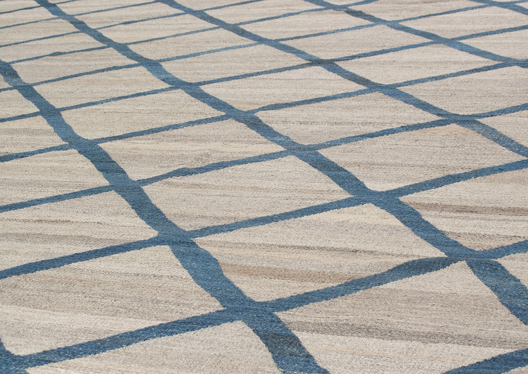 This modern rug with a beautiful natural background and blue pattern is comprised of 100% handspun and handcarded wool and natural dyes.
Custom color and size available. Rug size is 8'9