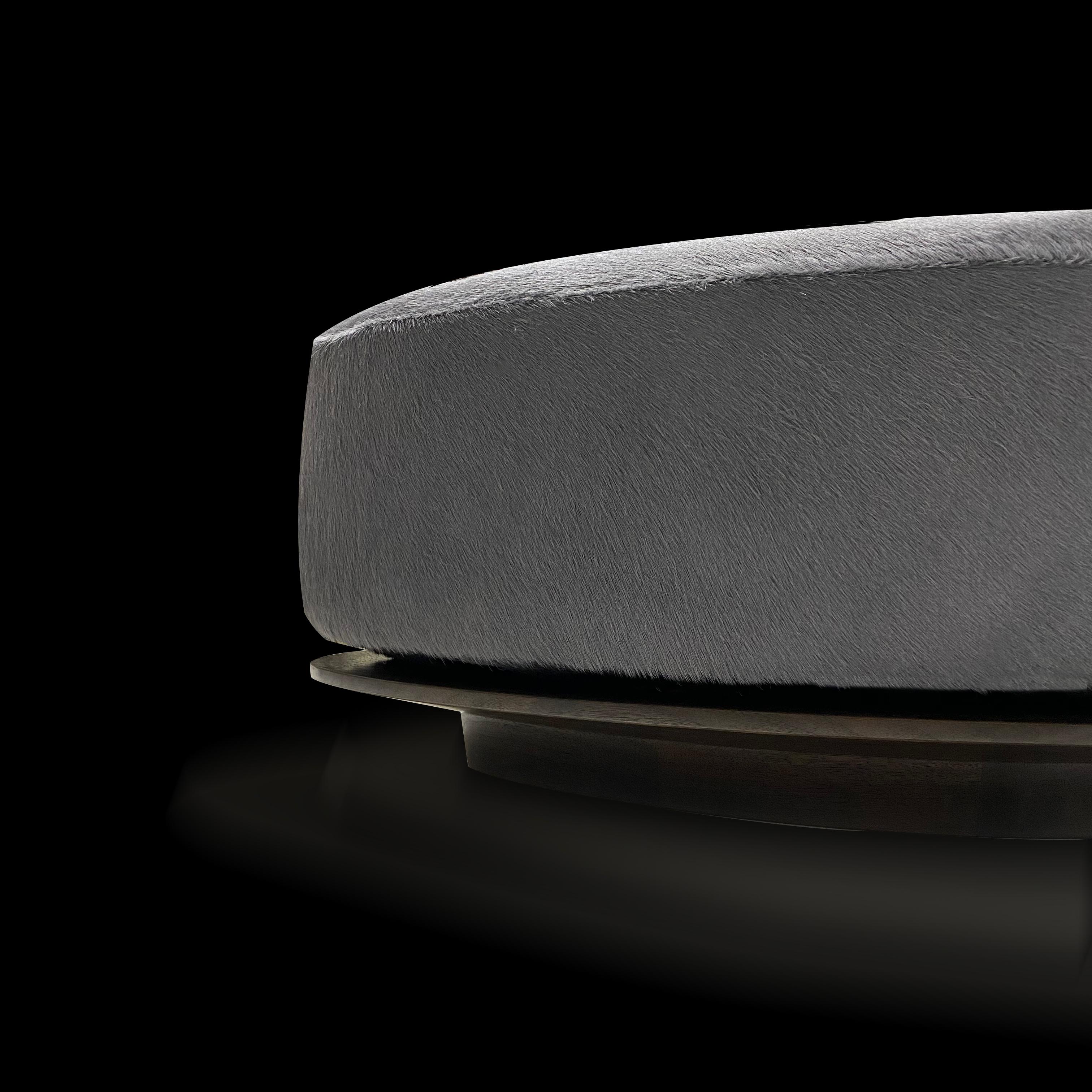 The Torta Triangle ottoman is inspired by a cake sitting neatly on a dessert plate.

Pictured in Edelman, charcoal gray hide on hair leather with ebonized walnut base

Measures: 31