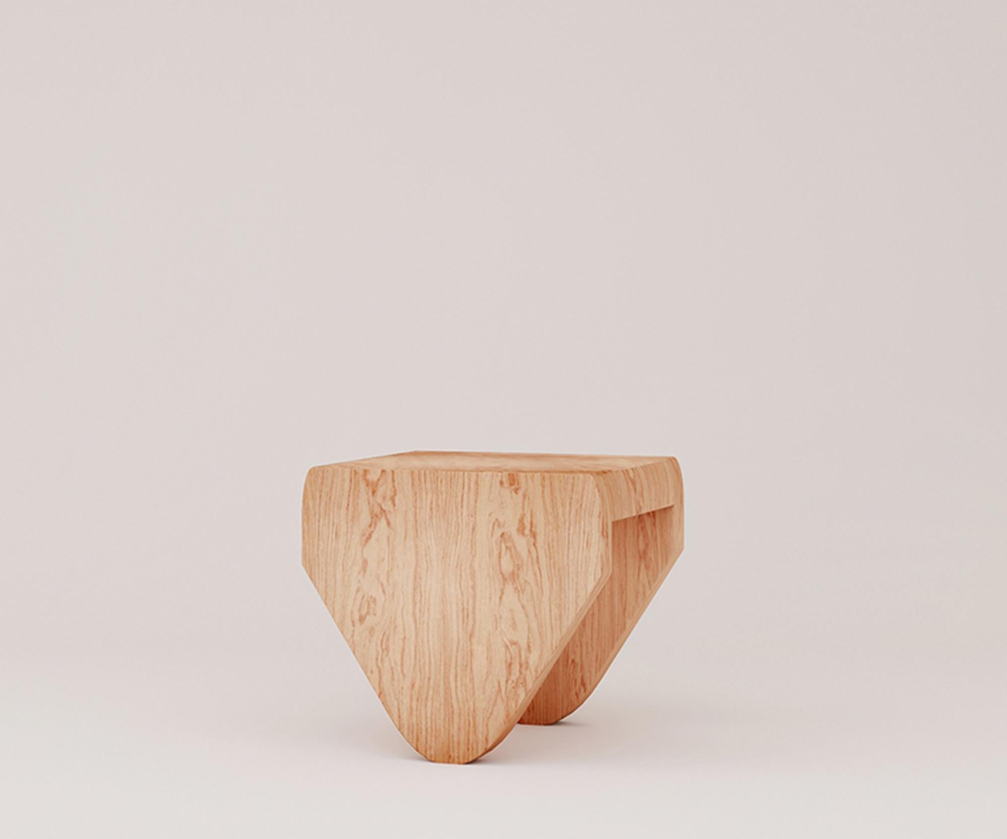 Simple and modern triangle table, which looks perfect when paired it with another. It will fit any corner at your home. Part of (the topography of our intimate being) Series.

Dimension. W 50 x D 45 x H 47 cm
Material. MDF wood, Oak veneer.
 