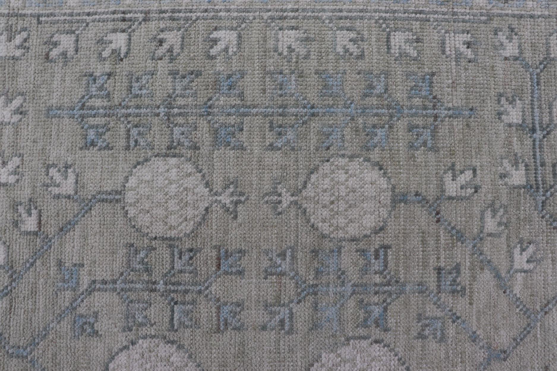 Afghan Modern Tribal Khotan Rug in Shades of Cream, Green, Blue, and Gray For Sale