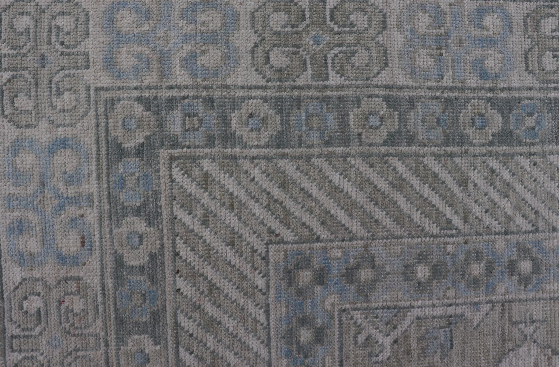 Modern Tribal Khotan Rug in Shades of Cream, Green, Blue, and Gray In New Condition For Sale In Atlanta, GA