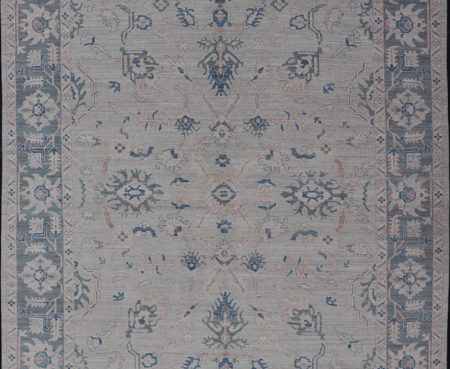  Large Modern  Oushak with Gray Colored Border and Light Silvery Gray Background. Country of Origin: Afghanistan; Type: Oushak; Design: Medallion, Tribal Medallion, All-Over; Keivan Woven Arts: rug AWR-8521. 

Measures: 9'10 x 13'10

A modern Oushak