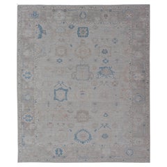 Modern Tribal Oushak with Light Taupe Colored Border and Off White Background