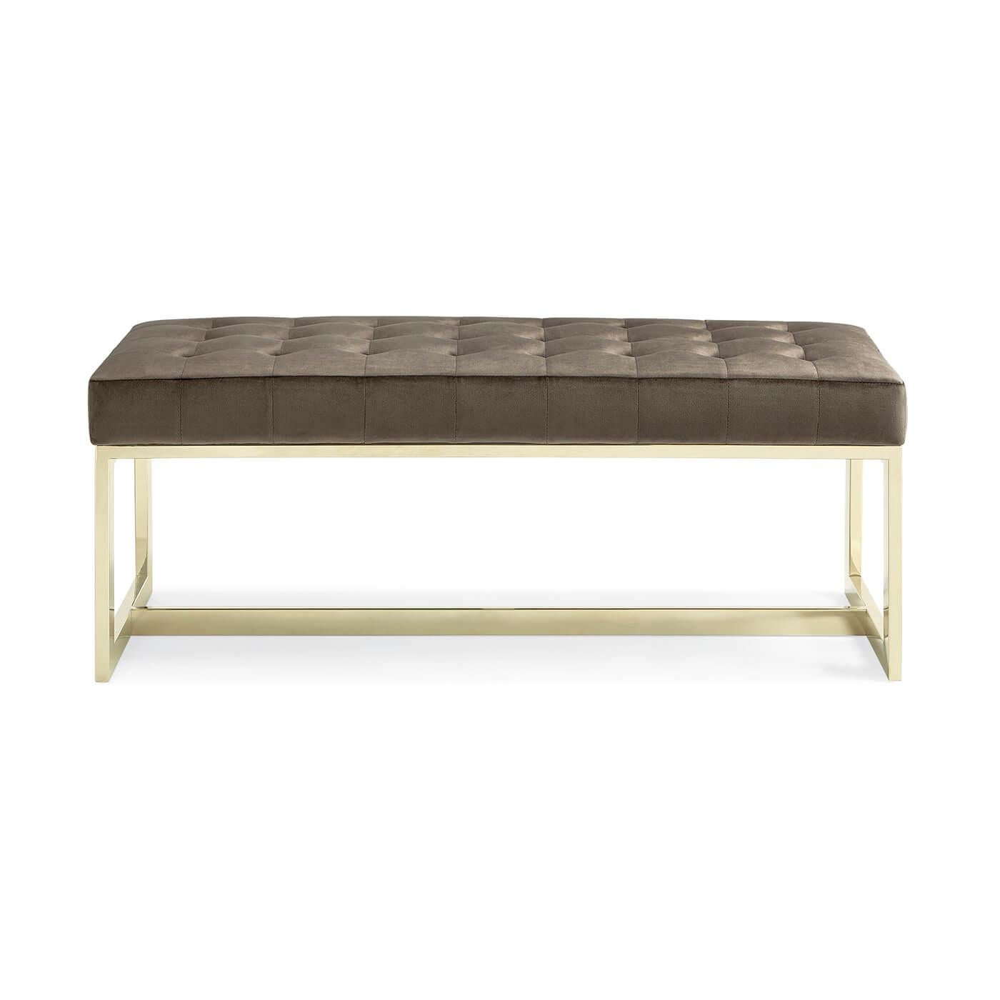Modern tufted bench with a boxed velvet tufted seat cushion on a gold-plated metal box frame with stretcher. Practical, yet sophisticated, this is a must-have addition to update any bedroom.

Dimensions: 44