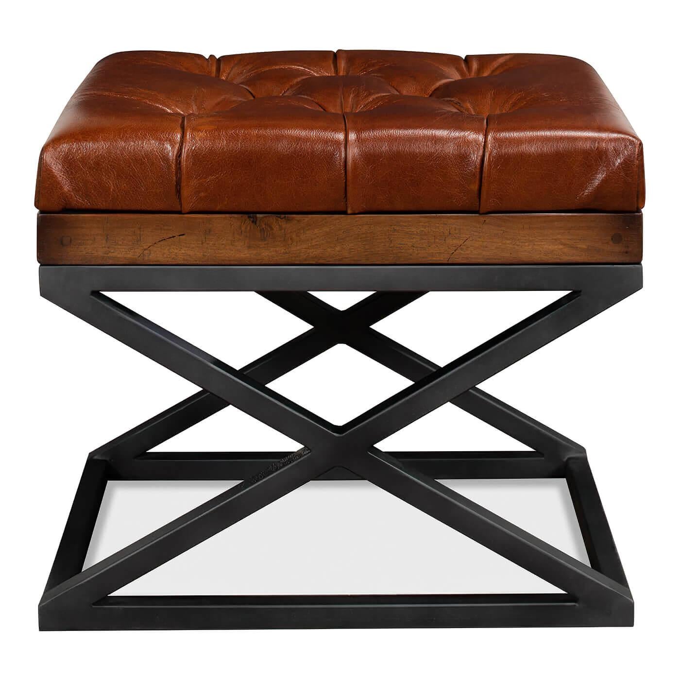 A modern tufted leather X frame stool, classic meets contemporary with this versatile piece. The top boxed cushion is crafted in rich brown leather accented with button tufting, it sits on an x shaped gunmetal frame. This piece is perfect to use as