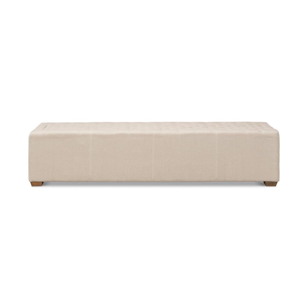 Modern tufted linen bench, the long tufted bench in natural beige linen, with American oak feet and brass traditional handle hardware.

Dimensions: 78