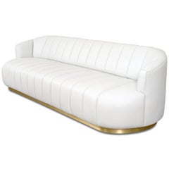 Modern Tufted Pearl White Faux Leather Sofa with Channel Tufting & Brass Toekick