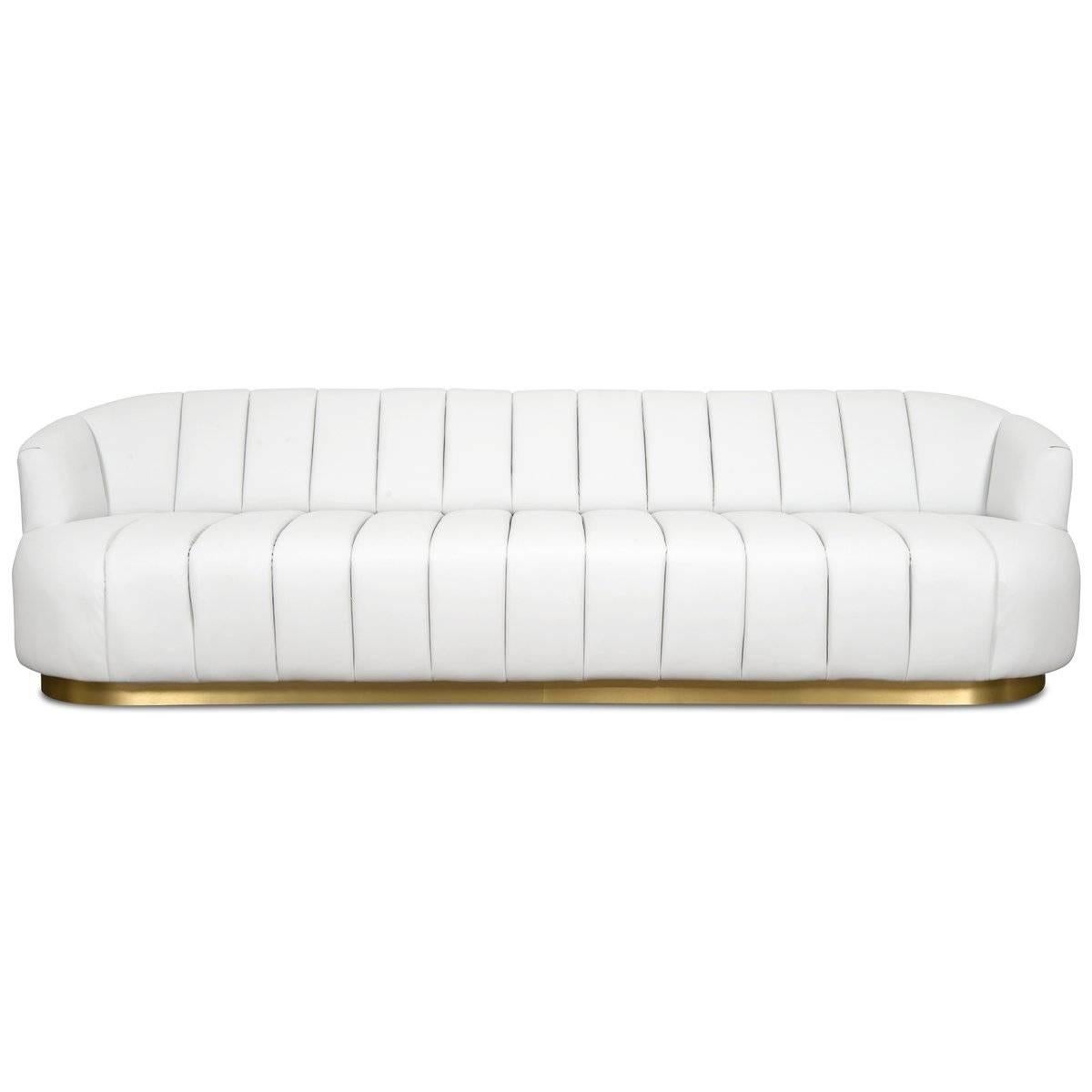 Mid-Century Modern Modern Tufted Pearl White Faux Leather Sofa with Channel Tufting & Brass Toekick For Sale