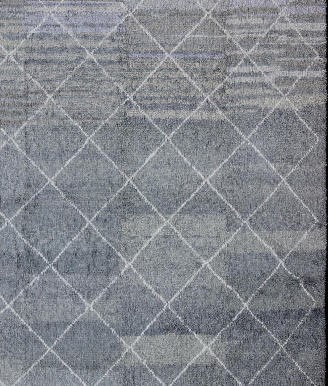 Moderner marokkanischer Teppich mit Allover-Gittermuster in Creme und Grau, Teppich TU-ALG-29, Herkunftsland / Art: Türkei / Stammesmuster

Dieser marokkanische/Tulu-Stammesteppich mit modernem Design in einem Gittermuster ist in Grau und Creme
