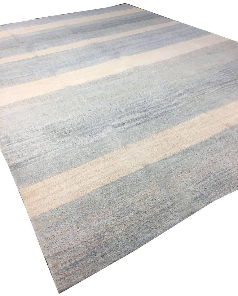 Modern Turkish flat-weave Hemp rug, 9'11 x 13'7. This is a new line fashioned from old materials. Vintage hemp flat-weaves are unraveled to provide yarn which is re-spun into sturdy yarns and then dyed in the light tones currently fashionable.