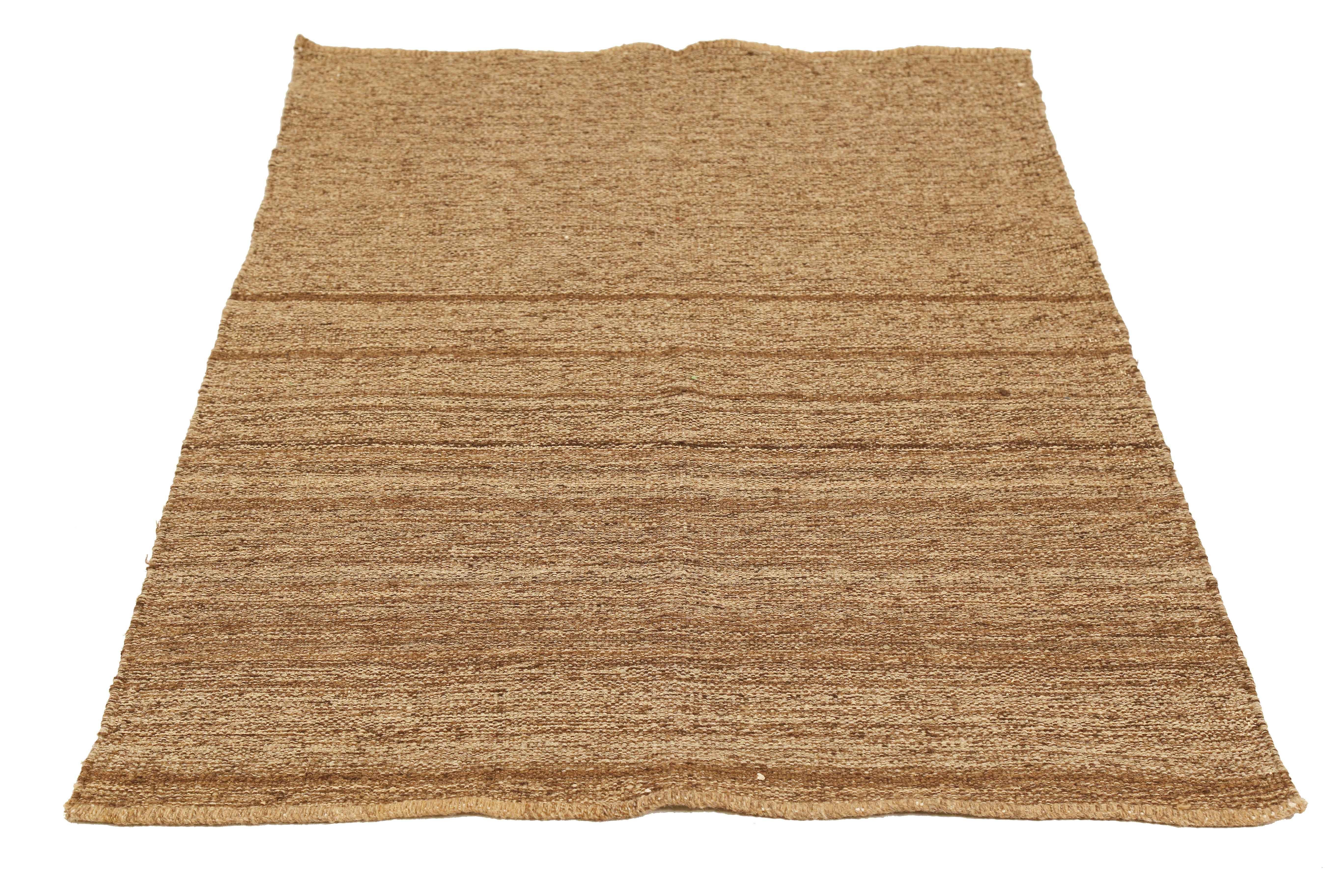 Turkish rug handwoven from the finest sheep’s wool and colored with all-natural vegetable dyes that are safe for humans and pets. It’s a traditional Kilim flat-weave design featuring elegant alternating patterns of red, navy and orange geometric