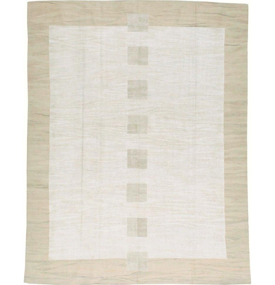 A modern Turkish flat-woven Kilim room size rug from the 21st century.