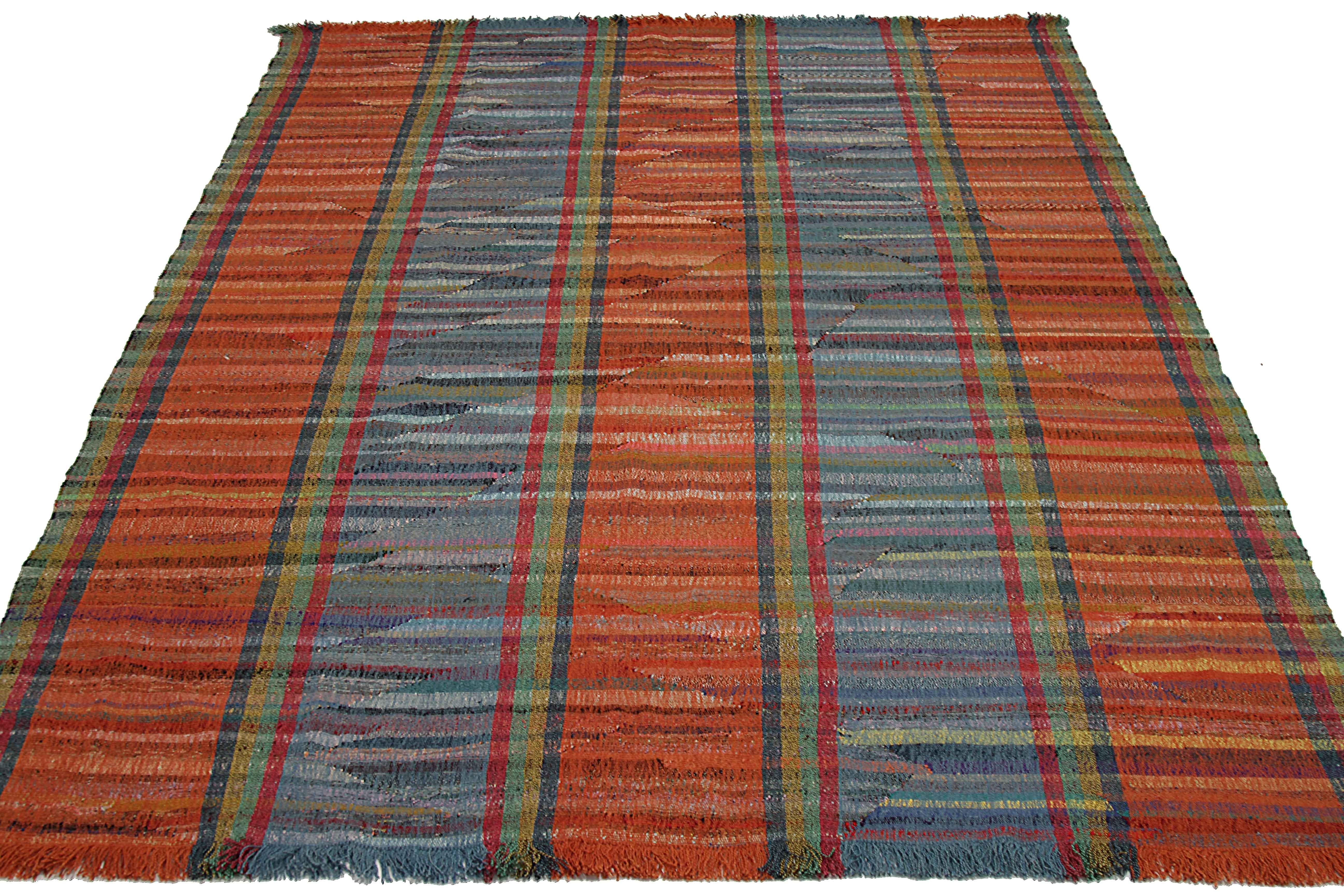 New Turkish rug handwoven from wool taken from antique fine carpets. It’s a traditional Kilim weaving featuring colored stripes over an ivory field. It’s a stunning piece to get for contemporary and modern spaces. It has a dimension of 10’1” x