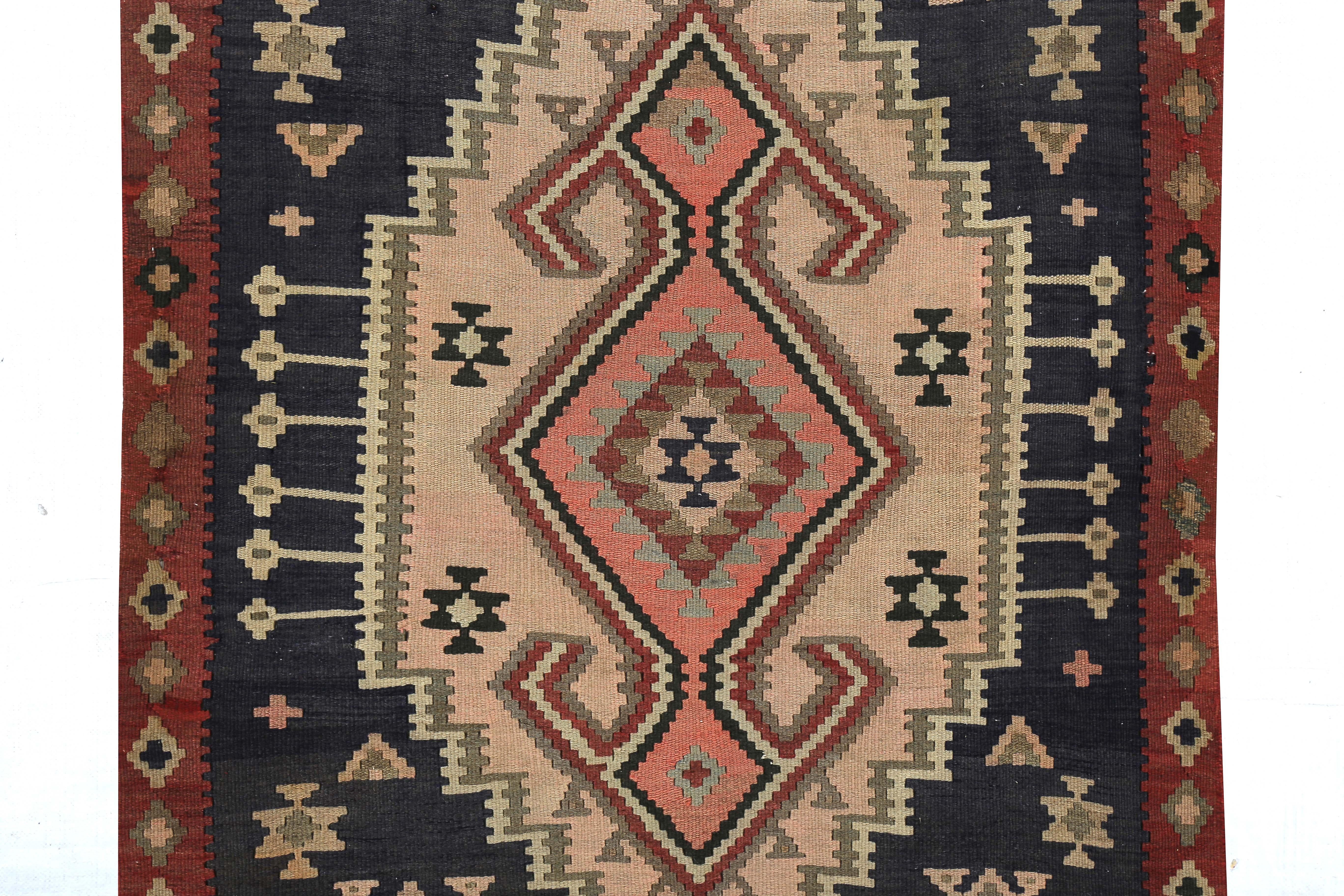 Hand-Woven Modern Turkish Kilim Rug with Orange and Beige Tribal Diamonds on Black Field For Sale