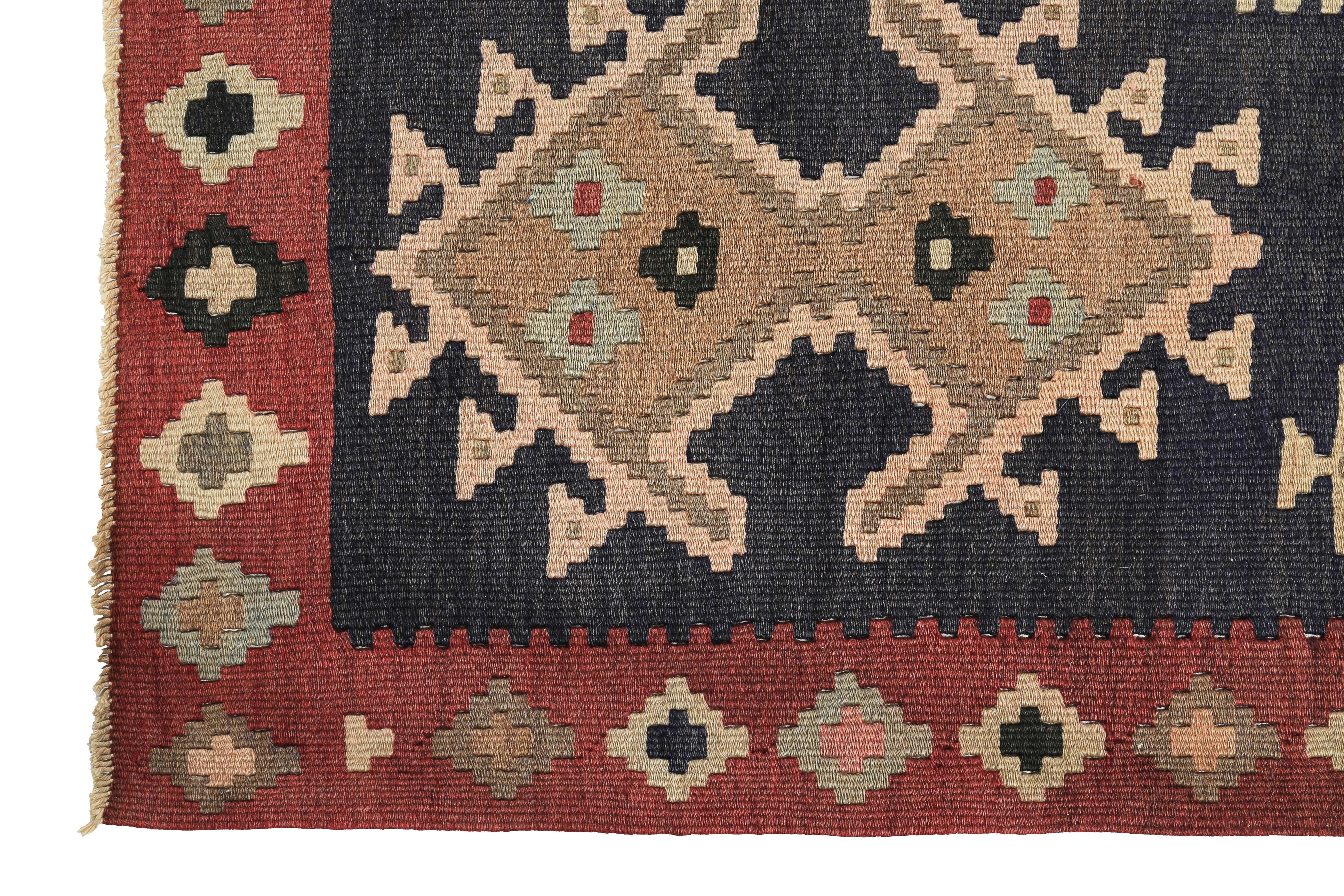 Modern Turkish Kilim Rug with Orange and Beige Tribal Diamonds on Black Field In Excellent Condition For Sale In Dallas, TX