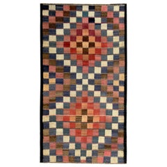 Tapis de Turquie moderne Kilim à carreaux rouges, roses et bleus