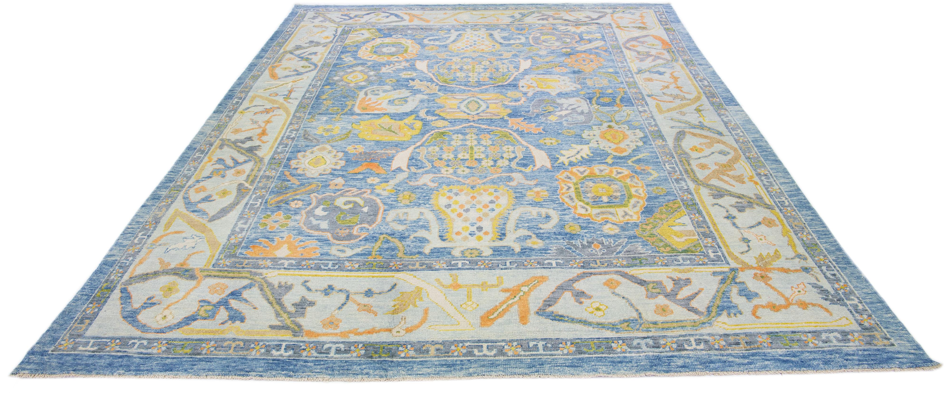 Hand-Knotted Modern Turkish Oushak Blue Handmade Wool Rug With Floral Motif For Sale